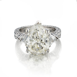 Ladies Platinum and Diamond Ring. 5.85ct Pear Shape Diamond