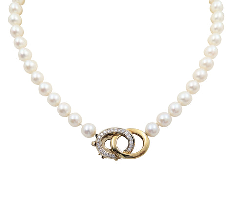 8mm Pearl Strand. 18kt White and Yellow Gold Diamond Swirl Clasp.