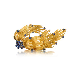 18kt Yellow Gold and Blue Sapphire Brooch. Weight: 20 Grams