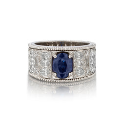 Blue Sapphire and Diamond 18kt White Gold Band.