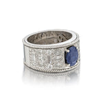 Blue Sapphire and Diamond 18kt White Gold Band.