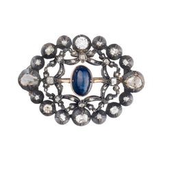 Vintage Cabochon Blue Sapphire and Mine Cut Silver and Gold Brooch.