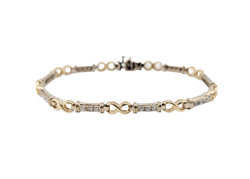 14kt Two Tone Diamond Bracelet.27 x 1.00ct Tw