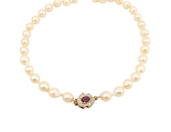 Ladies Baroque Pearl Strand. 7-1/2-8mm. 14kt  Ruby and Diamond Clasp.