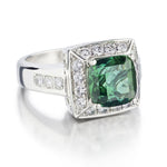 3.50 Carat Green Tourmaline And Diamond Halo Set WG Ring