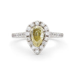 0.60 Carat Natural Light Fancy Yellow Pear-Shaped Diamond Halo Ring