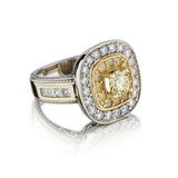 0.77 Carat Vivid Fancy Yellow Diamond And Yellow Sapphire Ring