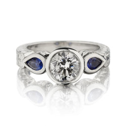 1.00 Carat Round Brilliant Cut Diamond And Sapphire Beaudry Platinum Ring