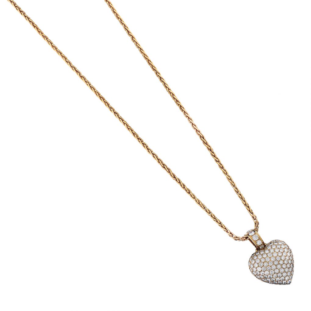 Diamond encrusted heart on sale pendant