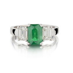 Green Emerald And Emerald Cut Diamond White Gold Three Stone Ring