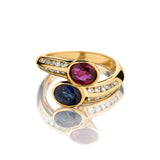 18KT Yellow Gold Ruby And Sapphire Cross-Over Ring