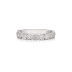 0.72 Carat Total Round Brilliant Cut And Princess Cut Diamond WG Ring