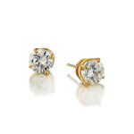 1.03 Carat Total Weight Round Brilliant Cut Y/G Diamond Stud earings.