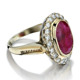 Impressive 7.00 Carat Ruby And Diamond Halo-Set Cocktail Ring