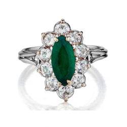 Ladies 18kt White Gold Green Emerald and Diamond ring.